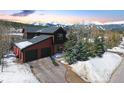 Charming mountain home featuring a two-car garage and stunning views of snow-capped peaks at 186 Rachel Ln, Breckenridge, CO 80424