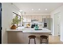 Bright kitchen with ample counter space, modern appliances, and stylish seating at 10310 E Jewell Ave # 57, Aurora, CO 80247