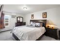 Spacious bedroom with a large bed and ample closet space at 10150 E Virginia Ave # 2-205, Denver, CO 80247