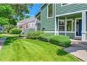 Attractive townhome featuring a well-maintained lawn and inviting entrance at 1229 James Cir # 1, Lafayette, CO 80026