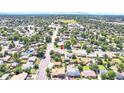 Aerial view of a charming neighborhood featuring tree-lined streets and well-maintained homes at 8030 Ogden St, Denver, CO 80229