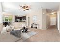 Spacious open-concept living area with modern kitchen and dining space at 9637 E 5Th Ave # 101, Denver, CO 80230