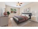 Bright bedroom with natural light, complemented by stylish furniture and décor at 9637 E 5Th Ave # 101, Denver, CO 80230
