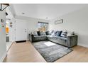 Cozy living room featuring a sectional sofa and plenty of natural light at 7973 Chase Circle # 54, Arvada, CO 80003