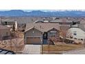 Well-maintained single Gathering home with a two-car garage and mountain views at 4561 Hope Cir, Broomfield, CO 80023