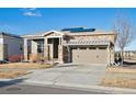 Single-Gathering home with a two-car garage and a stone and siding exterior at 8726 Holman Cir, Arvada, CO 80005