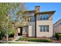 Two-story home with stone and stucco exterior, and a front porch at 9167 E 35Th Ave, Denver, CO 80238