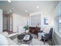 Cozy living room area with stylish decor and natural light at 13585 E 103Rd Pl, Commerce City, CO 80022