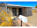 Charming front porch with detailed ironwork and mailbox at 6725 W 55Th Ave, Arvada, CO 80002