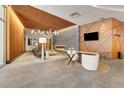 Beautiful and spacious lobby with modern decor, fireplace, and contemporary furniture at 1777 Larimer St # 902, Denver, CO 80202