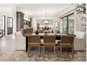 Elegant dining room featuring a large table, designer chairs, and an open concept design at 3147 Juniper Ct, Golden, CO 80401