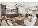 Inviting living room with stylish seating, custom built-ins, and an open flow to the kitchen at 3147 Juniper Ct, Golden, CO 80401