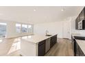 Open kitchen featuring a center island, stainless steel appliances, and recessed lighting at 39876 Floyd St, Elizabeth, CO 80107