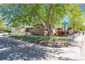 Exterior view of the house on the corner with well-maintained landscaping at 1522 Utah St, Golden, CO 80401
