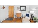 Cozy entryway with desk, chair, mirror, and decor, perfect for a small home office at 148 S Emerson St # 206, Denver, CO 80209