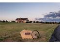 Beautiful home exterior view showing landscaping and house number, sitting on large sprawling property at 8456 N Sundown Trl, Parker, CO 80134