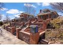 Charming brick home with terraced front yard and mature landscaping at 4149 Irving St, Denver, CO 80211