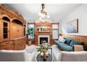 Elegant living room featuring a fireplace, hardwood floors, and stylish decor at 1022 N Pearl St # 202, Denver, CO 80203