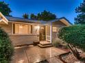 Charming home with a brick facade and covered front porch at 1145 W 101St Ave, Northglenn, CO 80260