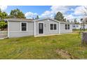 Well-kept single-story home with green lawn, offering a welcoming curb appeal at 762 S Paddock St, Elizabeth, CO 80107