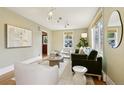 Cozy living area with comfortable seating, natural light, wood floors and modern accents at 2255 18Th St, Boulder, CO 80302