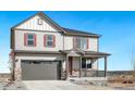 Two-story house with gray siding, red shutters, and a gray three-car garage at 18344 Prince Hill Cir, Parker, CO 80134