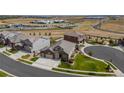 Luxury home community, featuring houses with modern architecture and landscaping at 15994 La Plata Peak Pl, Broomfield, CO 80023