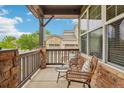 Relaxing front porch with comfortable seating and views of the surrounding neighborhood at 2605 Gray Wolf Loop, Broomfield, CO 80023