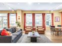 Bright living room filled with natural light, showcasing stylish furniture and decor at 1200 Cherokee St # 106, Denver, CO 80204