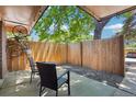 Outdoor patio with furniture and wood fence features convenient bicycle storage at 7995 E Mississippi Ave # F23, Denver, CO 80247