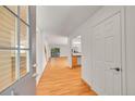 Open foyer featuring beautiful hardwood floors and lots of natural light at 10369 E Red Mtn, Littleton, CO 80127