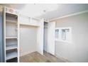 Bedroom with built-in closet and window at 4263 S Elati St, Englewood, CO 80110