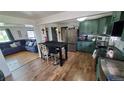 Spacious kitchen with modern appliances and a dining area at 7620 Hooker St, Westminster, CO 80030