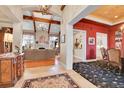 Grand entry with high ceilings, hardwood floors, and views to living areas at 5960 S Watson Ln, Littleton, CO 80123