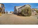 Street view featuring the home's exterior with mature landscaping, providing a welcoming curb appeal at 1552 Venice Ln, Longmont, CO 80503