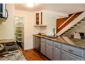Open kitchen featuring granite countertops, stainless steel appliances, and walk-in pantry at 827 Maxwell Ave # H, Boulder, CO 80304