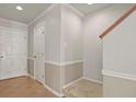 Bright entryway with tile flooring, white trim, and staircase access at 5779 Ceylon St, Denver, CO 80249