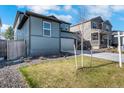 Well-maintained home with a manicured lawn and tasteful landscaping at 4644 S Kipling Cir, Littleton, CO 80123