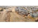 Aerial view of house and backyard, with a nearby walking path and bridge at 7112 E 131St Pl, Thornton, CO 80602