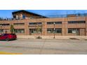 Modern commercial building with architectural details, street view, and parking at 2400 N Broadway # 4, Denver, CO 80205