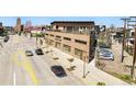 Modern commercial building with architectural details, street view, and parking at 2400 N Broadway # 4, Denver, CO 80205