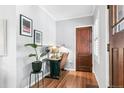 Bright home office with hardwood floors, built-in shelving, and natural light at 525 N Pearl St, Denver, CO 80203