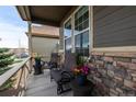 Cozy front porch with comfortable seating, providing a relaxing outdoor space at 549 Tippen Pl, Castle Rock, CO 80104