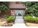 Inviting building entrance with well-maintained landscaping and a welcoming entryway at 4110 Hale Pkwy # 3K, Denver, CO 80220
