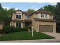 Charming two-story home with well-maintained landscaping at 7114 Mountain Brush Cir, Highlands Ranch, CO 80130