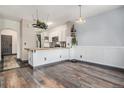Stylish kitchen with a breakfast bar, modern appliances, and ample counter space at 14400 Albrook Dr # 43, Denver, CO 80239