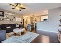 Open concept living space with updated kitchen and living room for easy entertaining at 1560 Olympia Cir # 108, Castle Rock, CO 80104