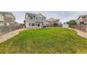 Large backyard featuring an expansive lawn, ideal for entertaining and outdoor enjoyment at 12981 E 108Th Way, Commerce City, CO 80022