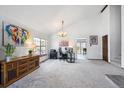 Bright, spacious room with vaulted ceilings, ample light, and versatile setup at 7942 S Vincennes Way, Centennial, CO 80112