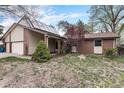 Lovely home featuring solar panels and well-maintained landscaping at 3312 S Ouray Way, Aurora, CO 80013